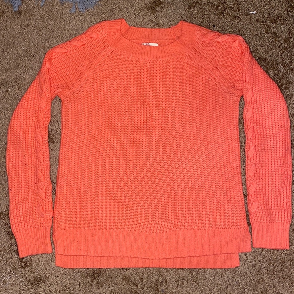 A nice pink knit sweater for a cold winter evening